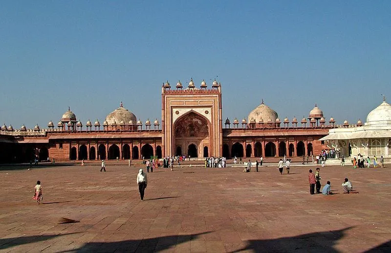 Muslim tourists praying at Jama Masjid or Fathepur Sikri near Agra.