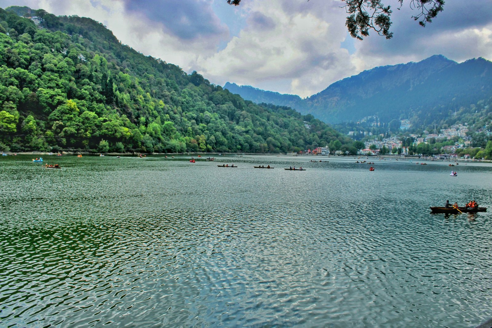 Enjoying a serene boat ride on Naini Lake during a Halal holiday in Nainital
