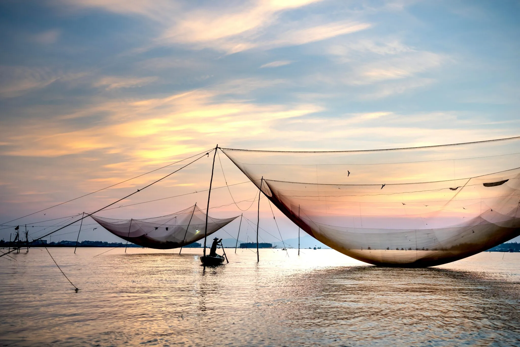 Chinese fishing nets at Fort Kochi during a halal-friendly holiday tour to Kerala.