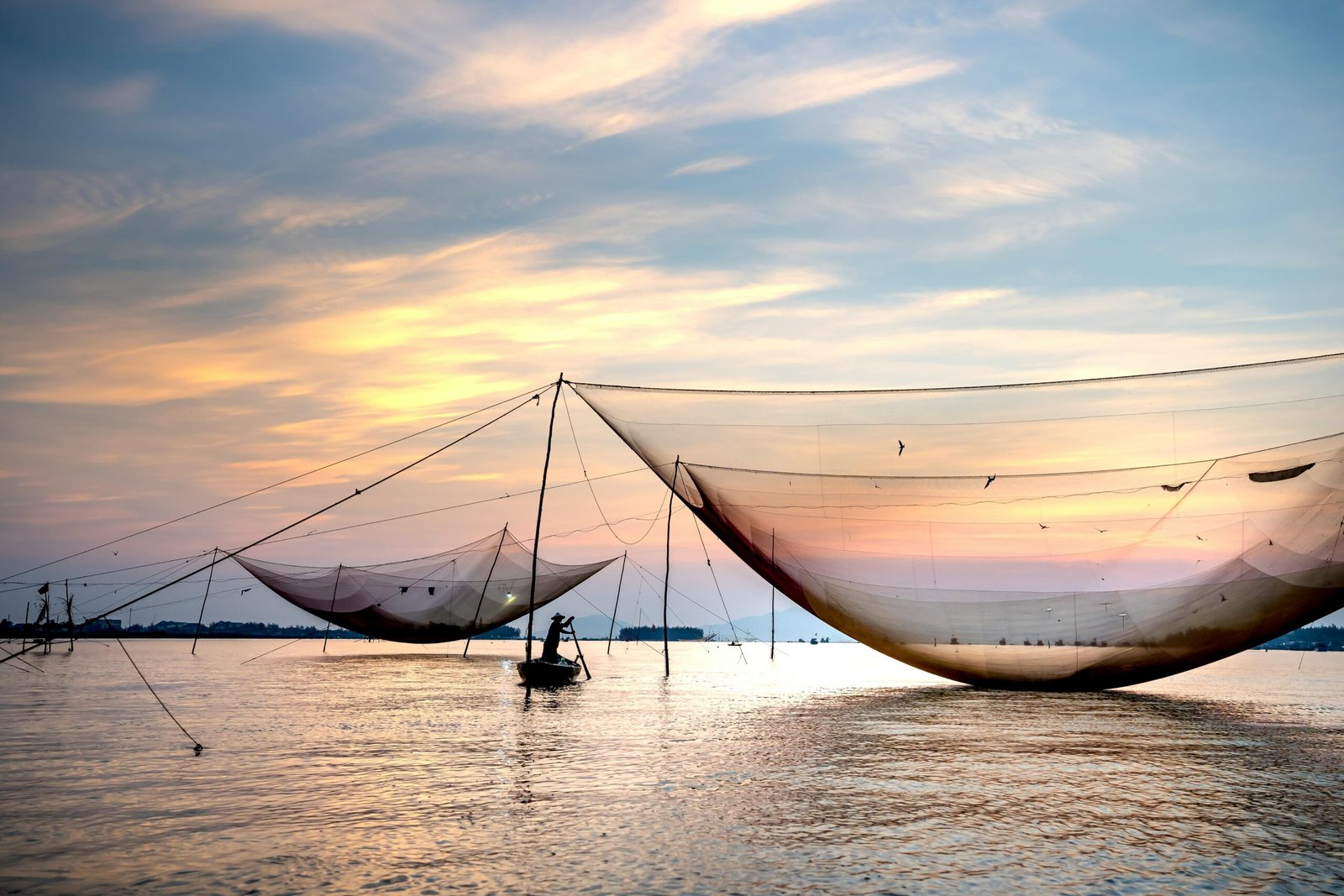 Chinese fishing nets at Fort Kochi during a halal-friendly holiday tour to Kerala.