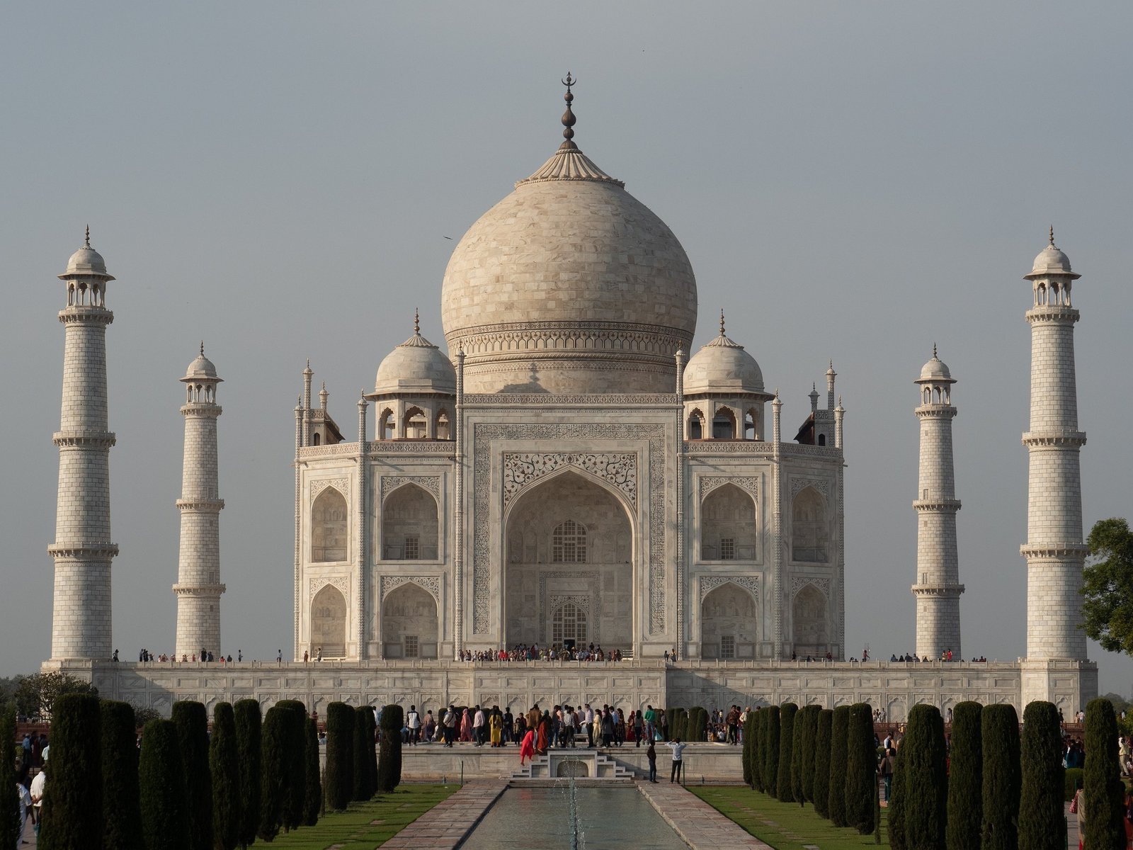 Muslim family visiting the Taj Mahal in Agra as part of a Halal holiday package covering the Golden Triangle and Aligarh