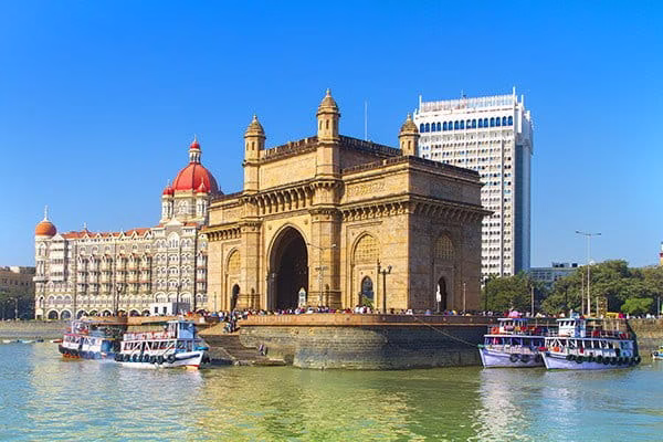 Gateway of India monument overlooking Mumbai harbour, a iconic starting point for tours