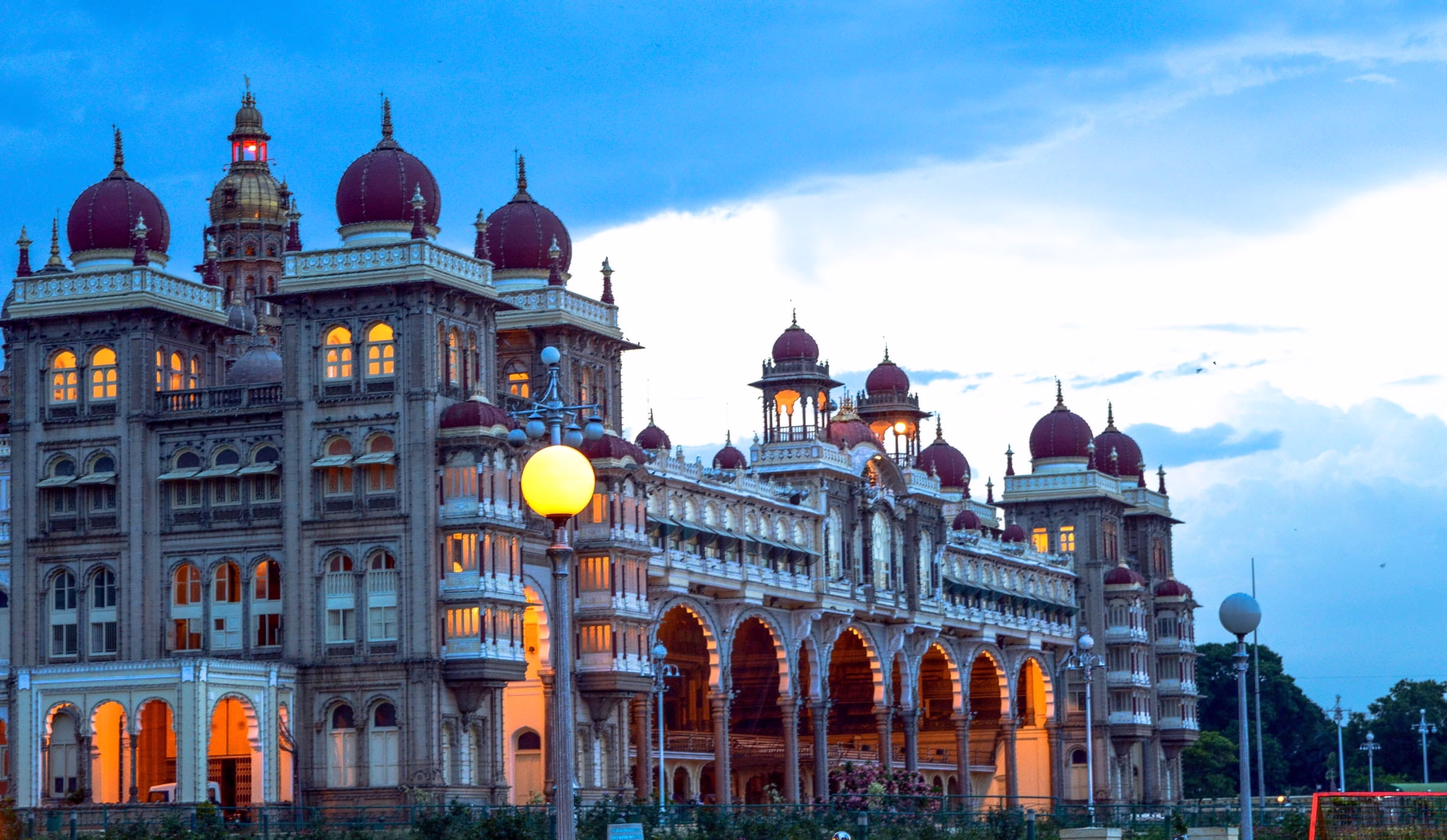 Mysore Palace illuminated at night, a cultural highlight for visitors to Karnataka