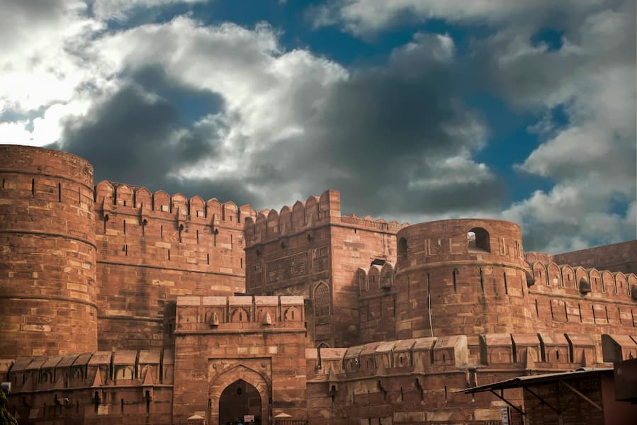 Muslim travelers exploring the UNESCO-listed Agra Fort on a Halal-friendly Golden Triangle tour