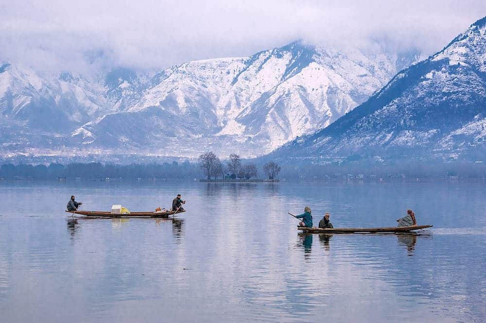 Dal Lake and Himalayan mountains on a Halal-friendly Kashmir holiday tour