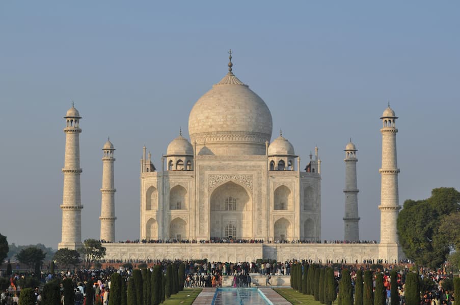 Muslim family admiring the Taj Mahal during a Halal-friendly Golden Triangle tour of Agra
