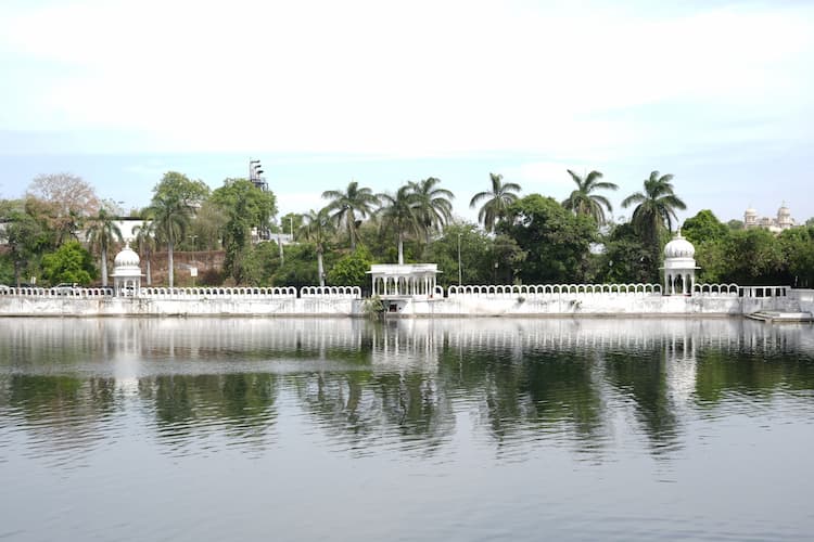 Muslim couple enjoying a peaceful boat ride on Fateh Sagar Lake, Udaipur