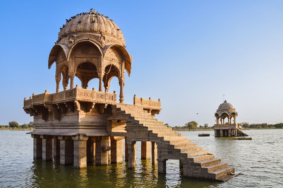 Muslim family enjoying a peaceful evening stroll at Gadisar Lake, Jaisalmer
