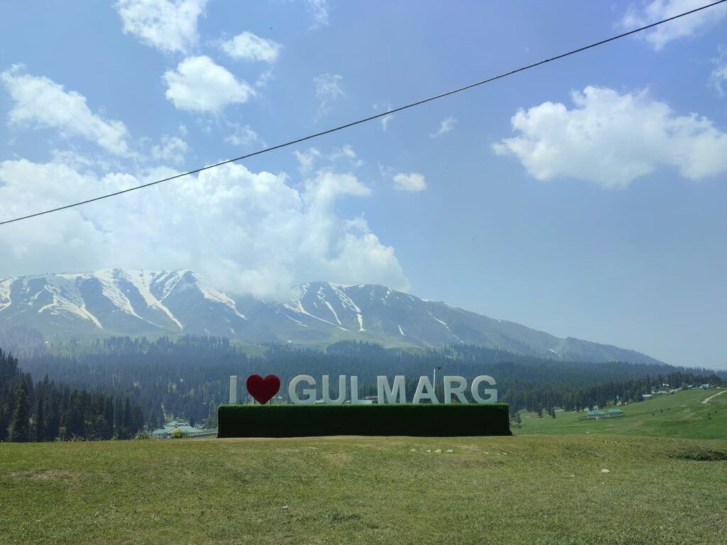 Muslim Family enjoying panoramic views in Khilanmarg Valley