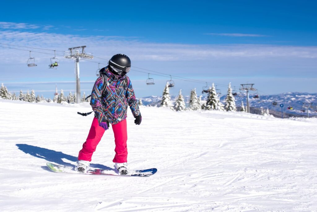 Traveler skiing on Gulmarg's snow-covered slopes