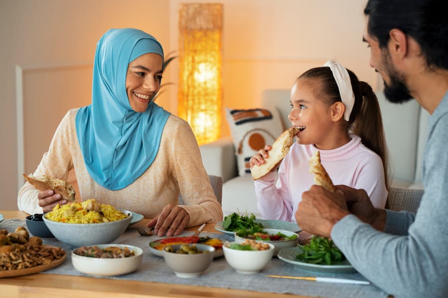 Muslim family enjoying certified Halal-friendly dining during their travels in India