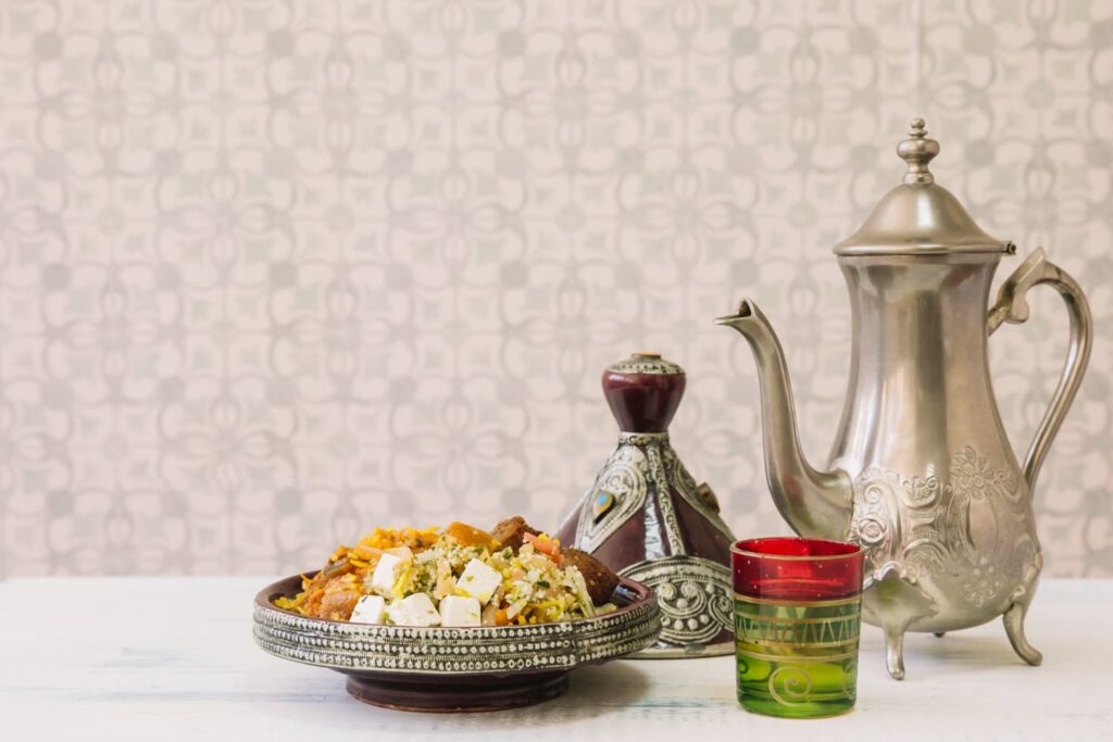 Saffron-infused Kahwa tea served alongside a halal Wazwan feast