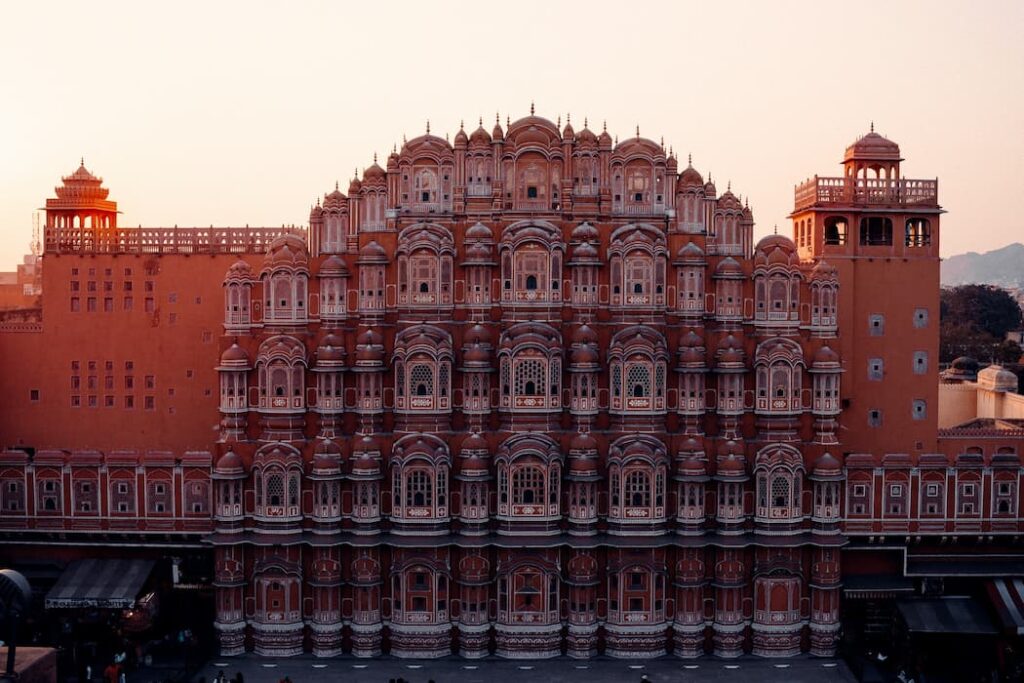 Muslim family exploring Jaipur's Hawa Mahal on a Halal-friendly Golden Triangle tour