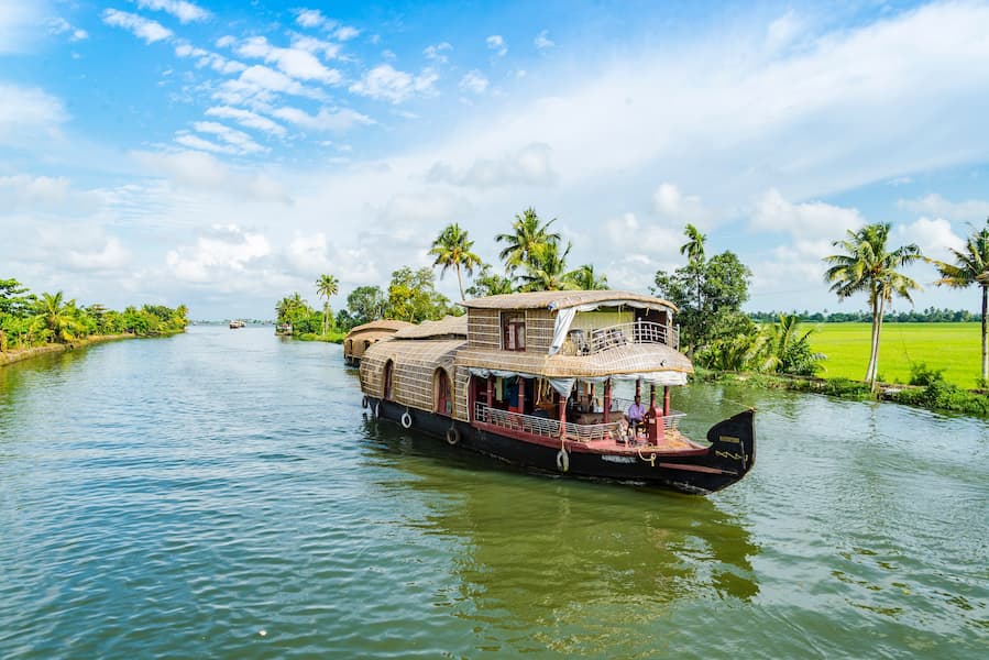 Muslim family on a Halal-friendly houseboat cruise through Kerala's backwaters