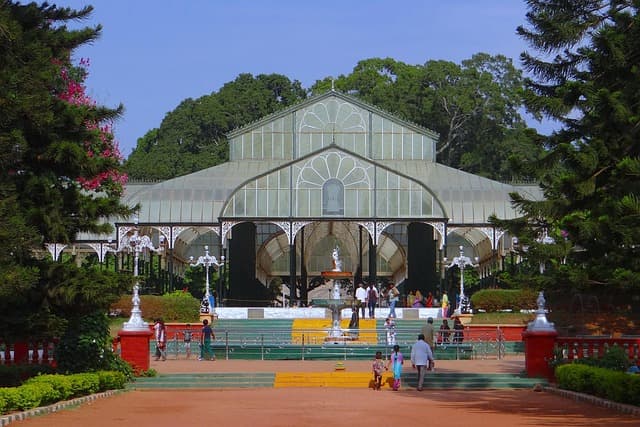 Muslim family enjoying Lalbagh Botanical Garden's Glass House in Bangalore