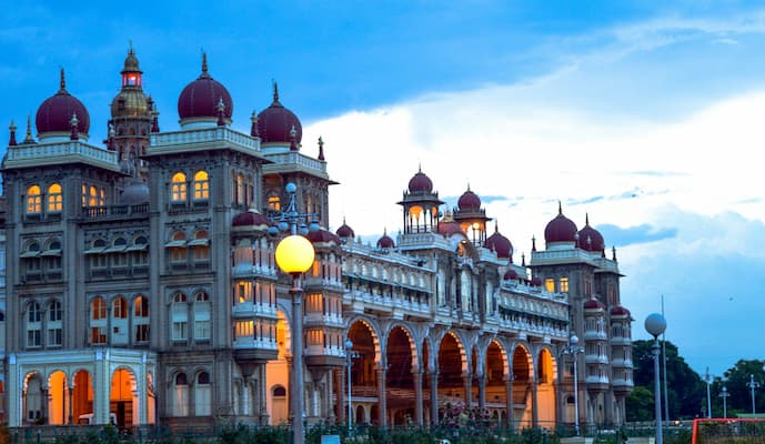 Muslim travelers exploring the Indo-Islamic architecture of Mysore Palace