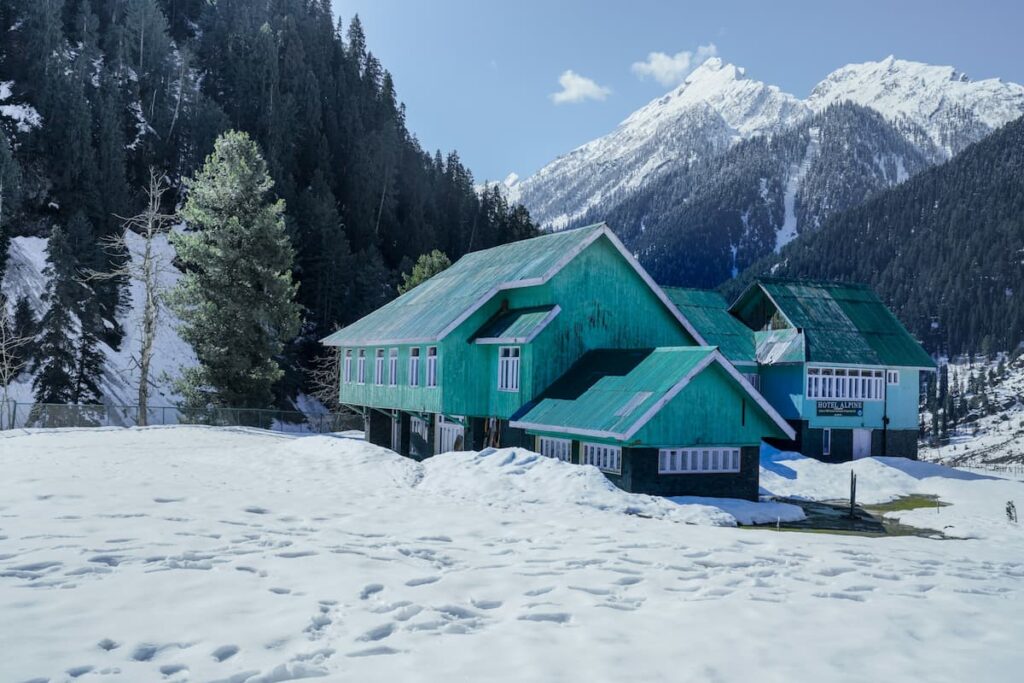 Snow-capped mountains and meadows in Betaab Valley