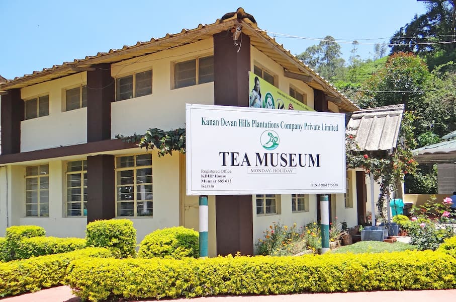 Muslim family visiting the Tea Museum in Munnar, showcasing Kerala's colonial tea heritage