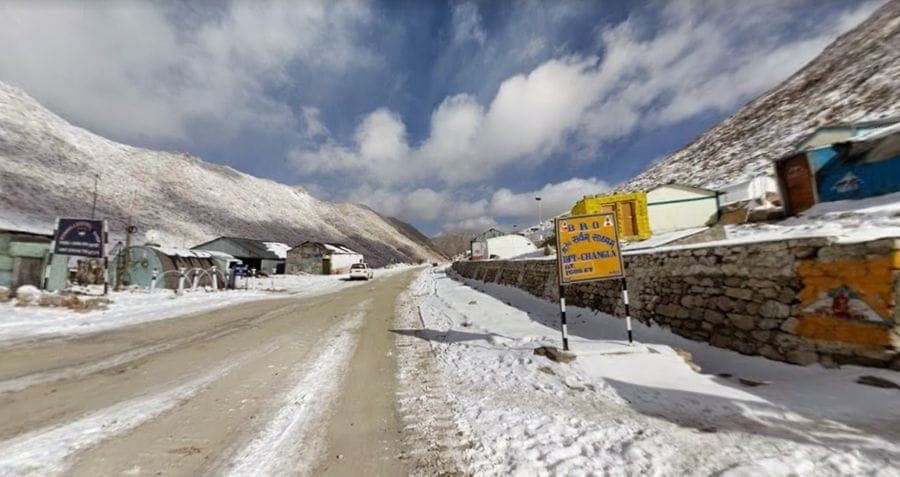 Muslim family crossing Chang La Pass en route to Pangong Lake
