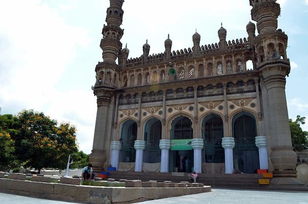 The mosque on Charminar's top floor, showcasing exquisite arches and intricate carvings in Hyderabad City of Nizams