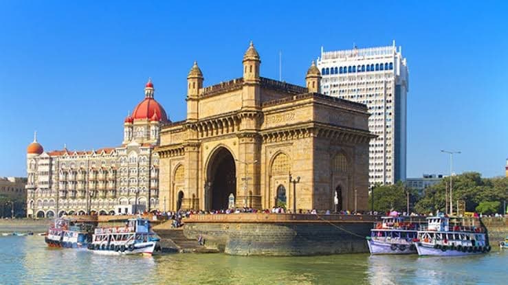 Muslim family visiting the Gateway of India, Mumbai's iconic monumental arch