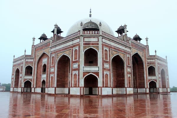 Muslim family visiting Humayun's Tomb UNESCO Heritage Site Delhi on Kashmir Delhi Taj Mahal Tour