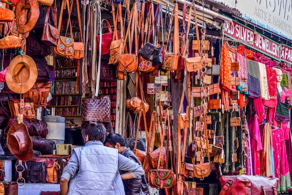 Muslim family browsing traditional Rajasthani jewelry at Johari Bazaar, Jaipur