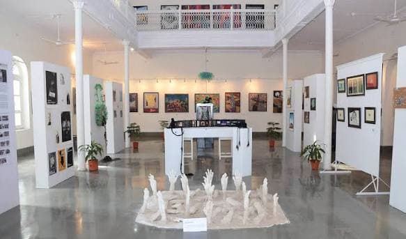 Muslim travelers exploring the Moinuddin Ahmad Art Gallery on the AMU campus