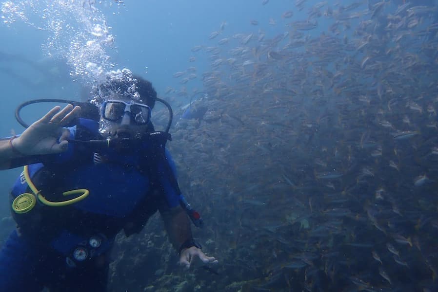 Muslim honeymoon couple snorkeling together at Elephant Beach, Andaman