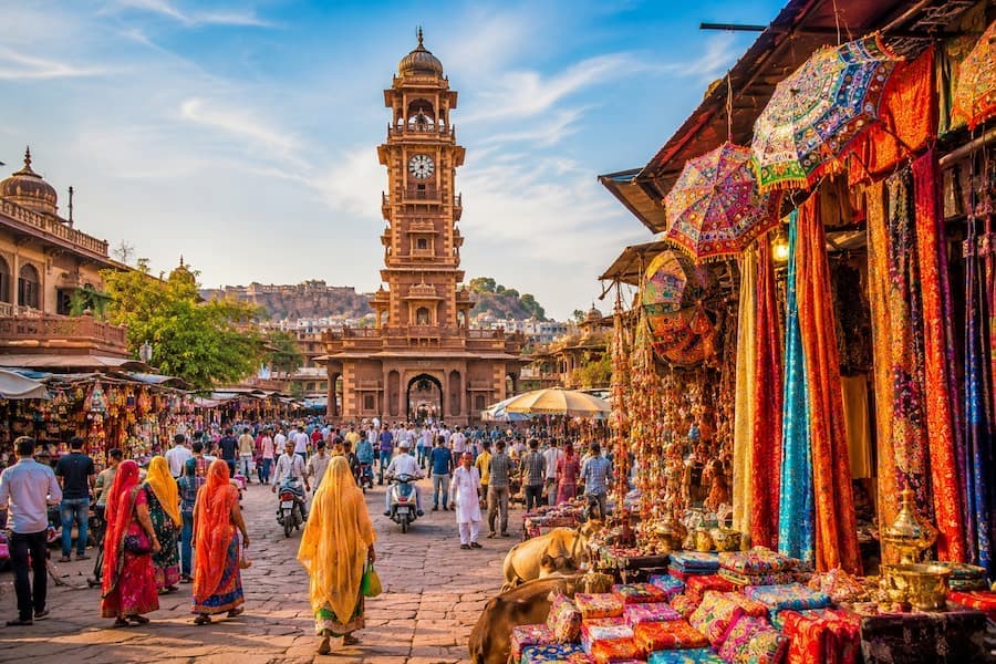 Muslim travelers exploring the vibrant markets and blue-painted streets of Jodhpur