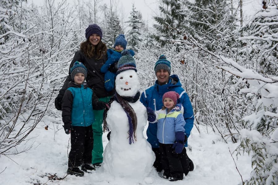 Muslim family enjoying Pahalgam valley scenic view on Kashmir Delhi Taj Mahal Tour