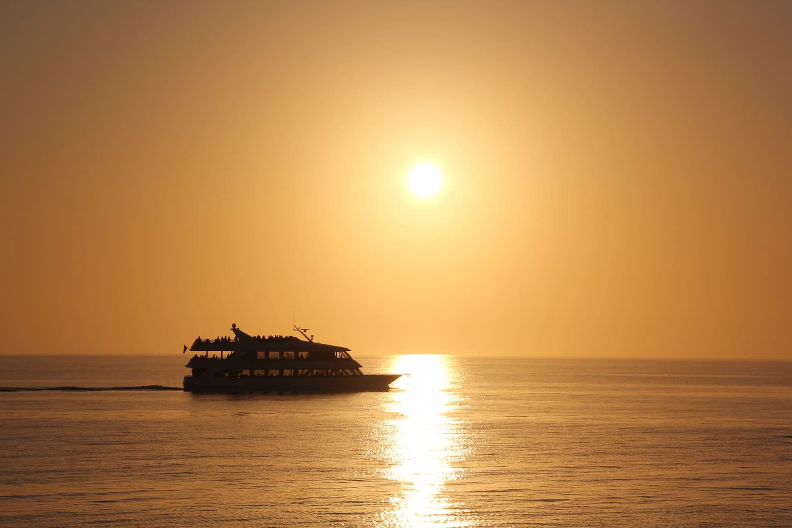 Muslim family enjoying a river sunset cruise near Palolem Beach, Goa
