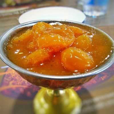 Qubani ka Meetha, a traditional Hyderabadi sweet dish enjoyed on Halal-friendly tours in Hyderabad