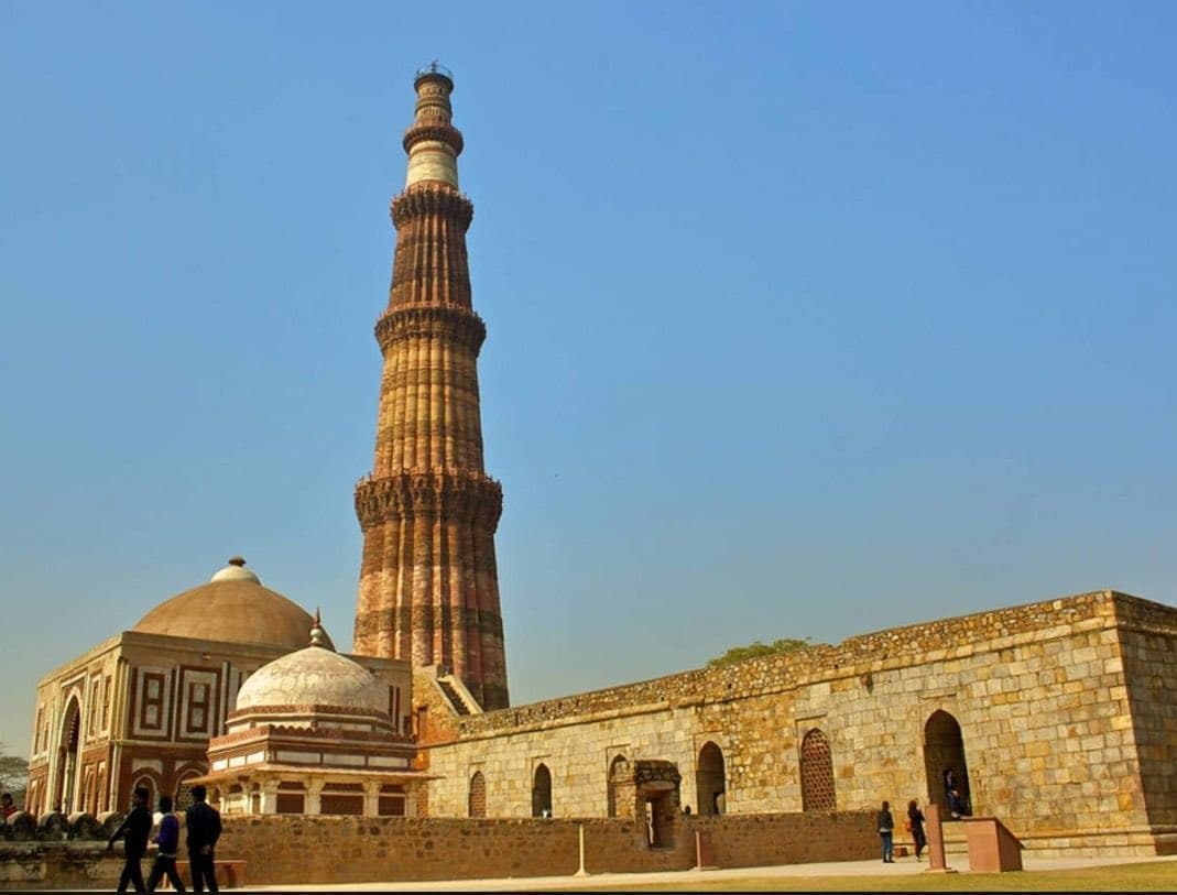 The Qutub Minar Complex, a testament to the dawn of Islamic architecture in India, on the Luxury Ziyarat Tour