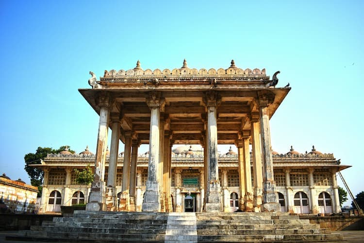 Muslim family exploring Sarkhej Roza, a Sufi mosque and tomb complex near Ahmedabad