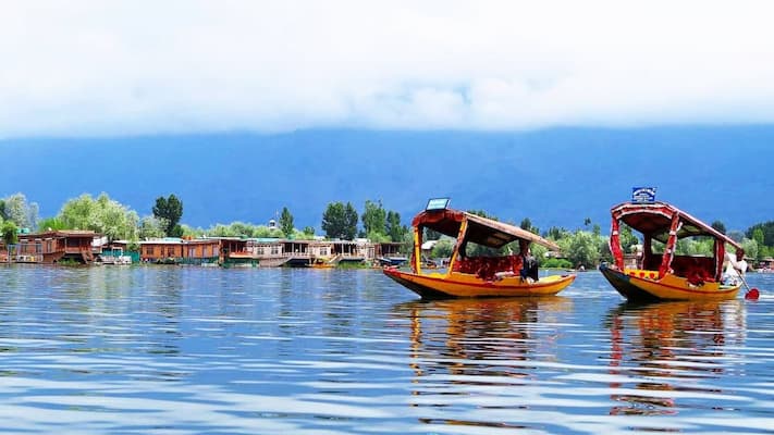 Shikara boat ride on Dal Lake during Kashmir Golden Triangle Tour