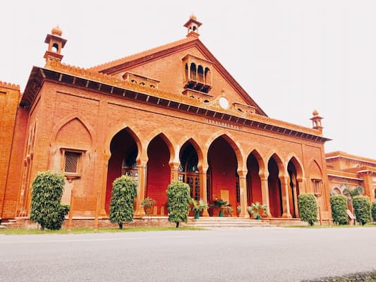 Muslim family visiting Strachey Hall, a highlight of this AMU Aligarh Travel Guide
