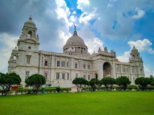 Muslim family exploring the Victoria Memorial's colonial architecture in Kolkata